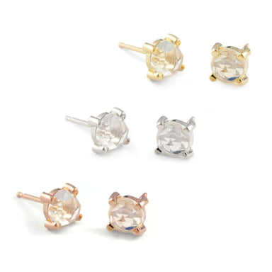 Rose cut moonstone stud earrings in 14kt yellow, white, and rose gold settings