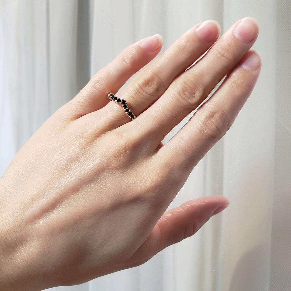 14k rose gold chevron black spinel ring shown on a hand
