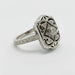 Side angle of engraved Edwardian diamond ring in white gold