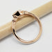 Side view of 14kt rose gold ring with crescent moon details, no gemstone visible