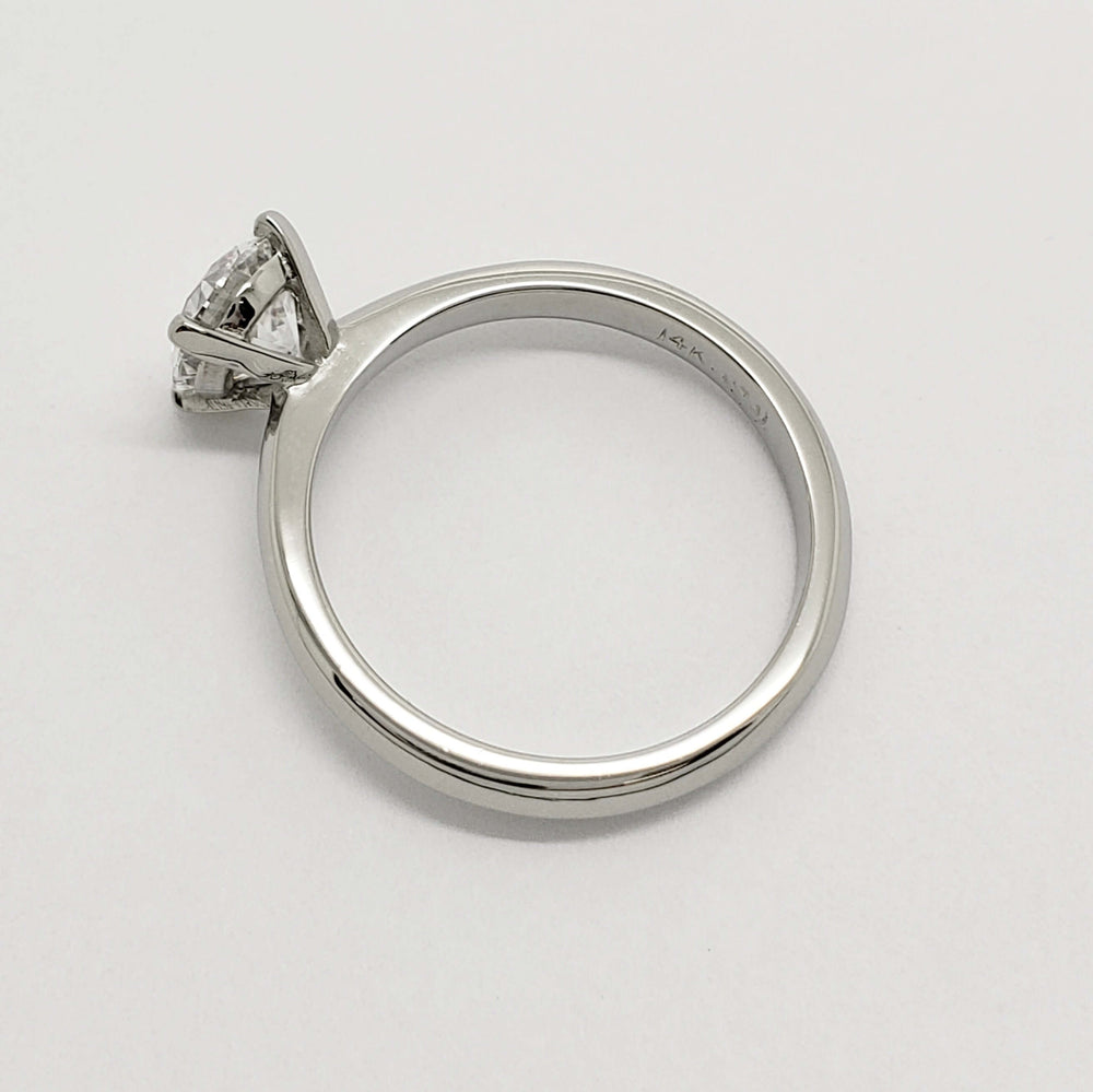 Side profile of 14kt white gold engagement ring with round lab diamond
