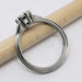 Side profile of 14kt white gold ring with oval lab diamond and detailed band