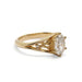 Side profile of 14kt yellow gold engagement ring with oval lab diamond