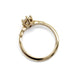 Side profile of 14kt yellow gold engagement ring with oval lab diamond