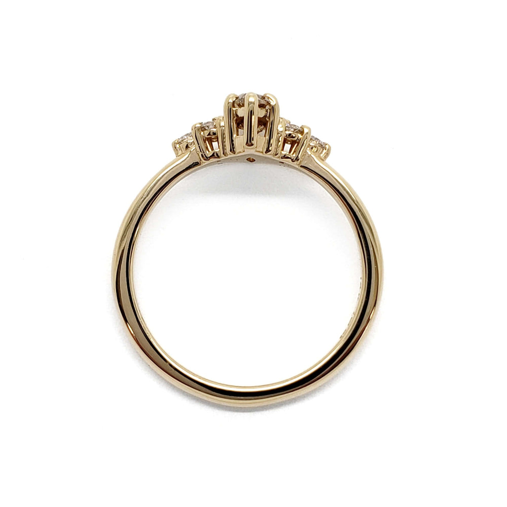 Side profile of handcrafted 14kt yellow gold ring setting