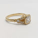 Side profile of 14kt yellow gold ring with asscher cut lab diamond and detailed millgrain