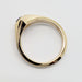 Side profile of 14kt yellow gold ring with hexagon Montana sapphire