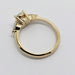 Side profile of 14kt yellow gold three-stone lab diamond engagement ring
