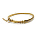 Side view of antique 15kt yellow gold bangle with seed pearls and leaf accents