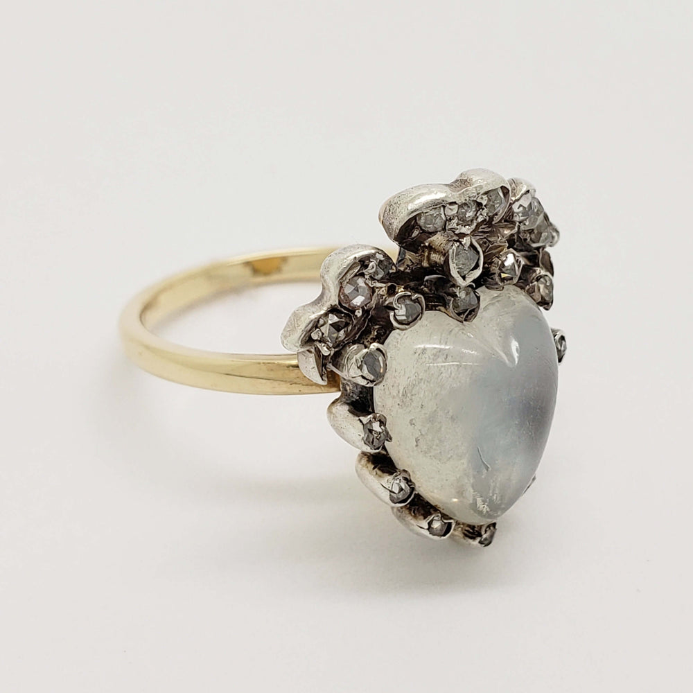 Side view of antique heart moonstone ring with rose cut diamonds and yellow gold band
