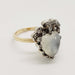 Side view of antique heart moonstone ring with rose cut diamonds and yellow gold band
