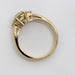 Side profile of engraved 14kt yellow gold ring with old European diamond setting