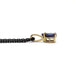 Side view of 14kt yellow gold pendant with pear cut lab alexandrite on black chain