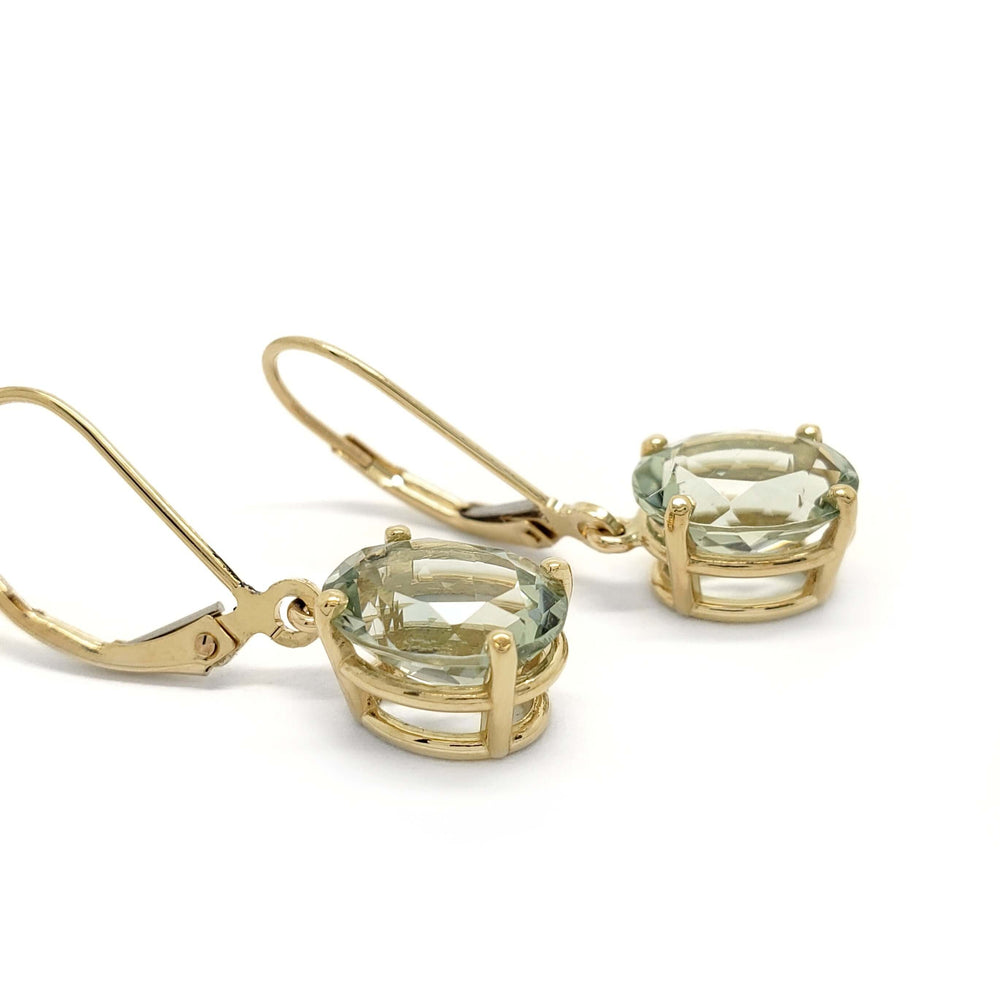 Side view of prasiolite dangle earrings in 14kt yellow gold showing gemstone setting