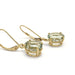 Side view of prasiolite dangle earrings in 14kt yellow gold showing gemstone setting