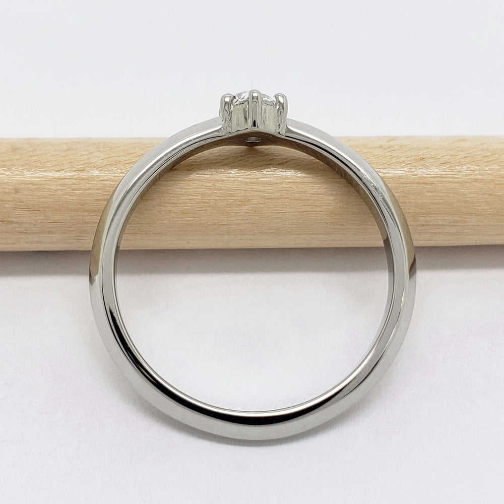 Side profile of white gold engagement ring with rose cut diamond