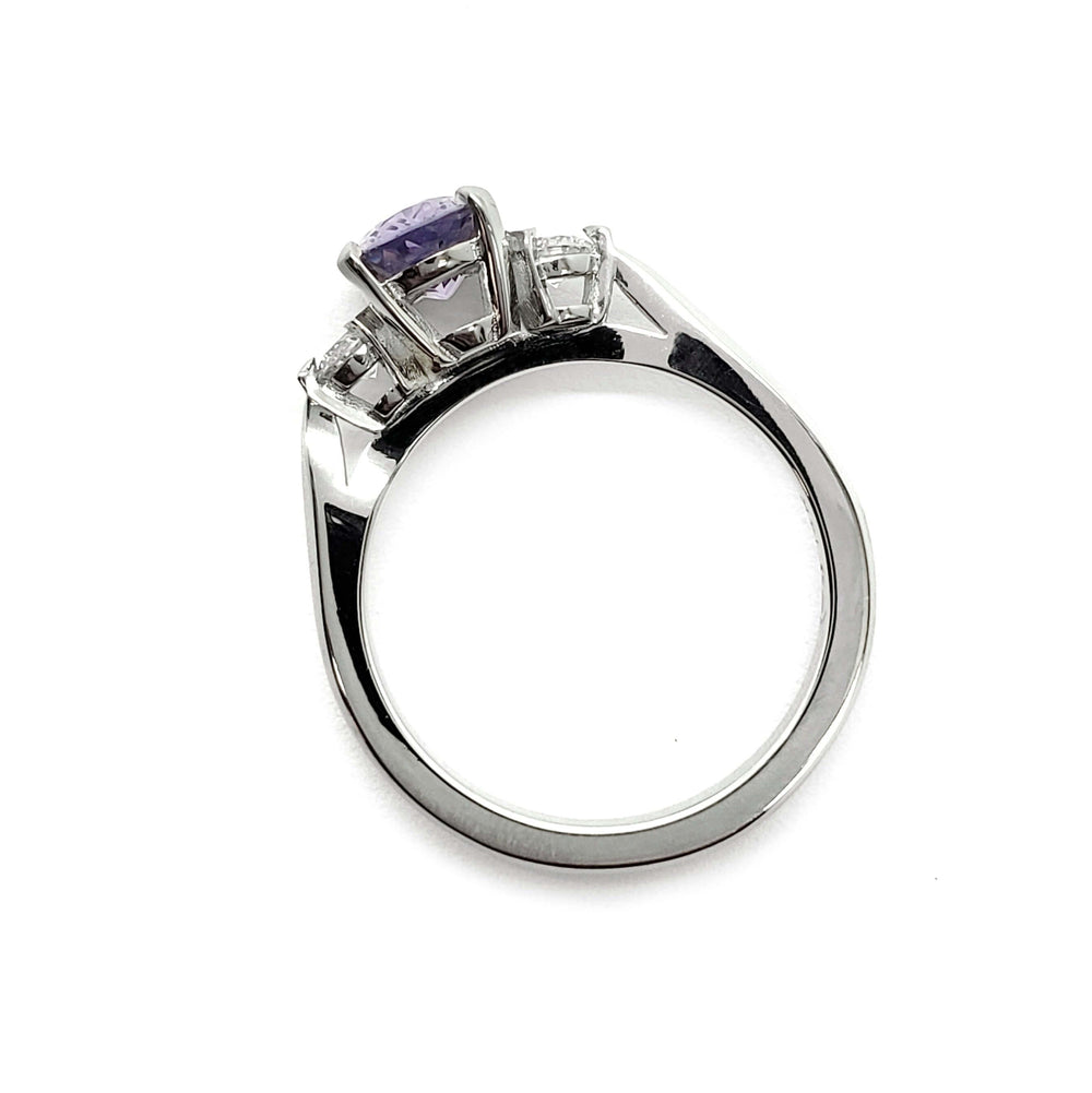 Side profile of white gold ring showing lavender sapphire and diamond setting
