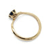 Side profile of yellow gold Montana sapphire ring showing six-claw setting