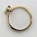 Side profile of yellow gold engagement ring with cushion lab diamond