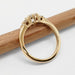 Side view of 14kt yellow gold lab diamond engagement ring showing claw setting and polished band