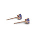 Side view of 14kt gold tanzanite stud earrings with round stones in four-claw settings