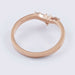 Side view of 14kt rose gold chevron diamond wedding ring band