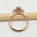 Side view of 14kt rose gold ring with purple sapphire and lab-grown diamonds on a pencil