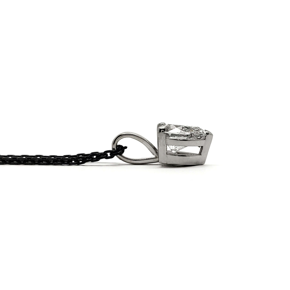 Side profile of 14kt white gold heart lab diamond pendant with black chain