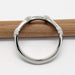 Profile view of 14kt white gold wedding band with millgrain detail on a pencil