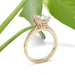 Side view of 14kt yellow gold engagement ring with cushion cut lab diamond and pave-set shoulders