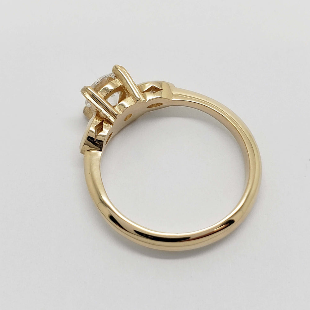 Side view of 14kt yellow gold ring band and setting for lab diamond engagement ring