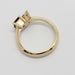 Side view of 14kt yellow gold ring setting with diamond and teal sapphire
