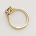 Side view of 14kt yellow gold ring with filigree basket and millgrain edge
