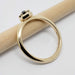 Side profile of 14kt yellow gold ring with hexagon salt and pepper diamond setting