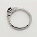 Side profile of 14kt white gold Montana sapphire and lab diamond engagement ring