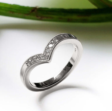Chevron wedding band in 14k white gold with millgrain and pave Canadian diamonds, side view