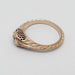 Side view of hand engraved 14k rose gold diamond ring with intricate filigree