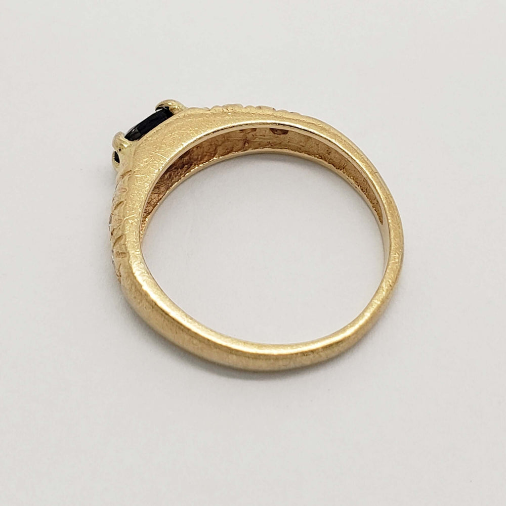 Side view of vintage 14kt yellow gold pinky ring showing band details