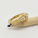 Side view of vintage 18kt yellow gold diamond ring on pencil