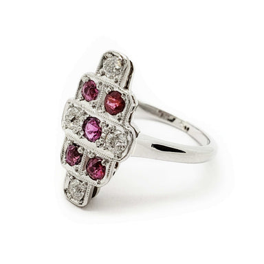 Side view of vintage 18k white gold ruby and diamond ring with intricate setting