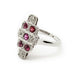 Side view of vintage 18k white gold ruby and diamond ring with intricate setting