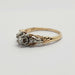 Side profile of vintage two-tone gold diamond ring with detailed setting