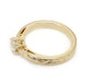 Side view of wheat engraved 14k yellow gold band with round Canadian diamond