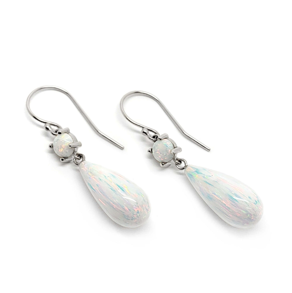 Simulated opal dangle earrings in 14kt white gold with round and teardrop stones