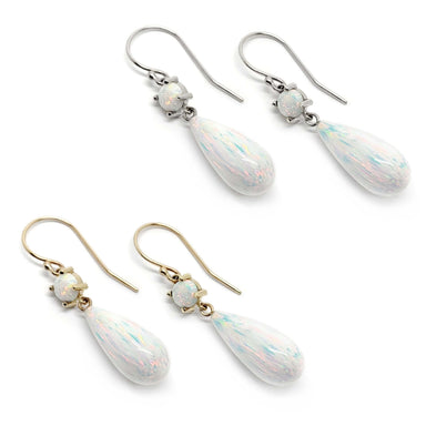 Simulated opal dangle earrings in 14kt yellow and white gold with round and teardrop stones