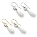 Simulated opal dangle earrings in 14kt yellow and white gold with round and teardrop stones