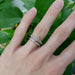 Stacked white gold lab diamond wedding ring set on hand