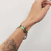 Vintage Canadian crest bracelet in sterling silver shown on wrist