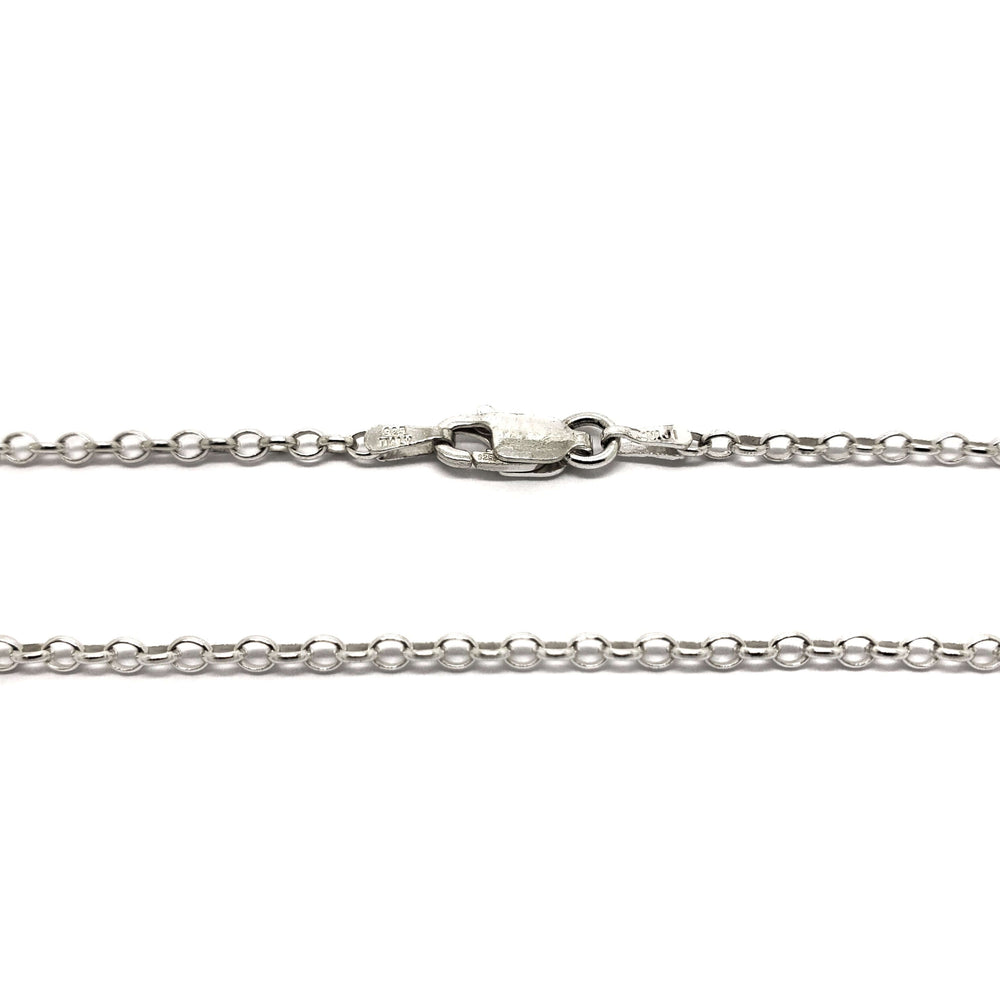 Close-up of sterling silver cable chain with lobster clasp closure