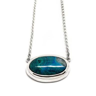 Sterling silver necklace with an oval green-blue malachite cabochon pendant